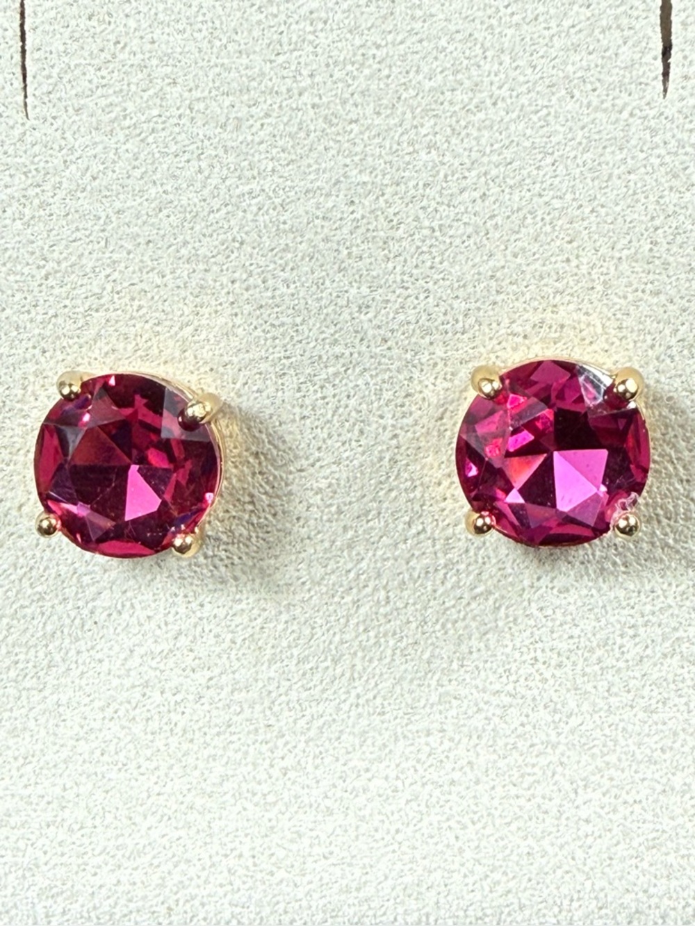Kate Spade Gold tone pink stud earrings.